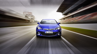 Blue car street tall buildings - motion blur free wallpaper