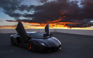 Black sports car sunset matte 2 - daarken free wallpaper