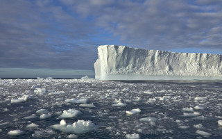 Large iceberg ocean ice floes - a large iceberg free wallpaper
