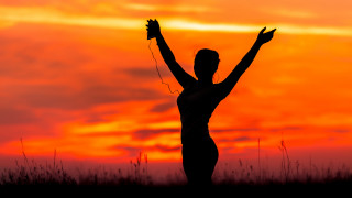 Woman field arms up backlighting - daphne mcclure free wallpaper