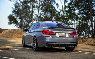 Silver car forest parking lot - side profile free wallpaper for desktop