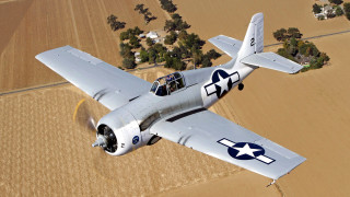 Small airplane flying over crops - felixkelly free wallpaper