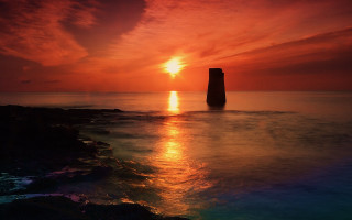 Sunset ocean rock mountain mystical - orange sky above free wallpaper