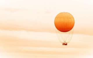 Hot air balloon sunset magical - a person inside free wallpaper
