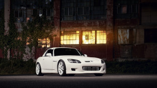 White sports car night city 2 - a white sports car free wallpaper