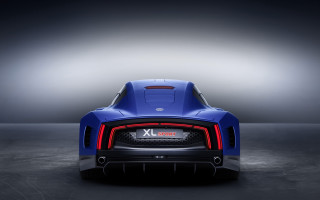 Blue sports car dark room 31 - a spotlight free wallpaper