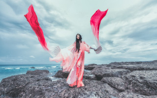 Woman long dress ocean rocks - a red scarf free wallpaper