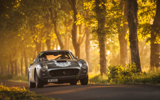 Vintage sports car woods sunset - fantastic realism free wallpaper