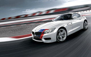 White bmw sports car track - motion blur free wallpaper
