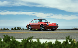 Red porsche ocean tree landscape - renaissance free wallpaper