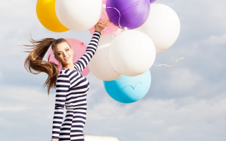 Woman balloons smiling beachball joyful - cheerful free wallpaper