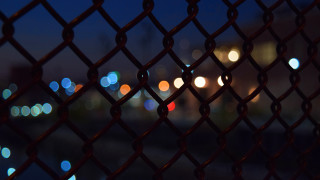 Blurry city night fence lights - andor basch free wallpaper