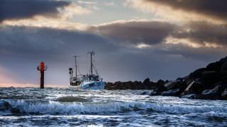 Boat lighthouse rocky shore stormy - stormy weather free wallpaper