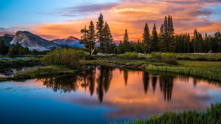 Sunset mountain lake forest sky - a beautiful sunset over a mountain lake free wallpaper