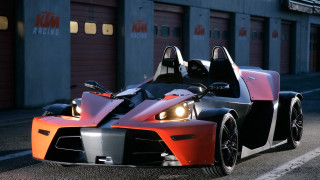 Car lighted parked building garage - front view free wallpaper