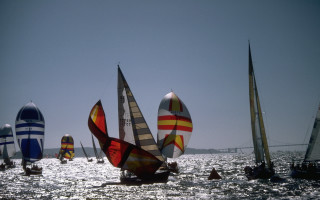 Sailboats ocean sky bridge precisionism - a sky background and a bridge in the background free wallpaper