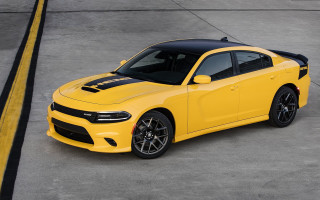 Yellow dodge charger concrete lot - a yellow line free wallpaper