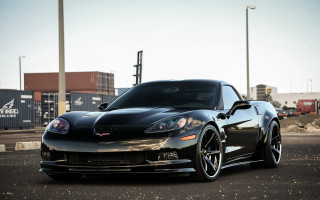 Black sports car parking lot 16 - a parking lot next free wallpaper