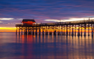 Pier red light sunset reflection - a pier free wallpaper