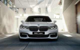 White car street building sign 2 - a white car free wallpaper