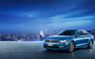 Blue car city skyline night 4 - a blue car free wallpaper