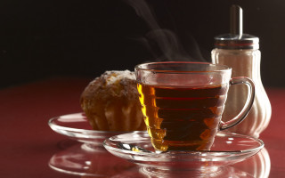 Tea donut stilllife food photography - a red table cloth free wallpaper