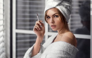 Woman towel holding cigarette fur - a towel free wallpaper