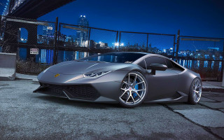 Silver sports car night city 5 - a city skyline in the background free wallpaper for desktop