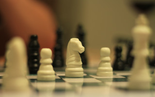 Chessboard white horse black pieces - a chess board free wallpaper