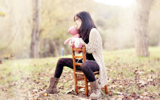 Woman sitting chair teddy bear - the ground and trees free wallpaper
