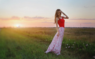 Woman dress field sunset sky 2 - the sun setting behind her free wallpaper