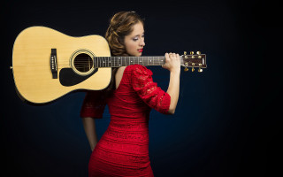 Woman red dress guitar serious - a red dress holding free wallpaper