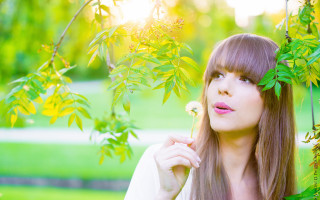 Woman long hair flower sky 2 - long hair holding free wallpaper