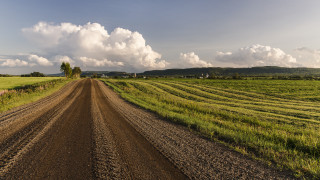 Dirt road field sky clouds 2 - ultra wide angle free wallpaper