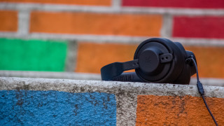 Headphones brickwall colorful wall serialart - a brick wall in the background free wallpaper
