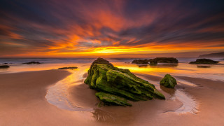Rock formation beach sunset clouds 2 - a rock formation free wallpaper