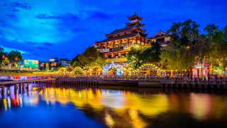 Castle tower river cityscape night - a tower free wallpaper