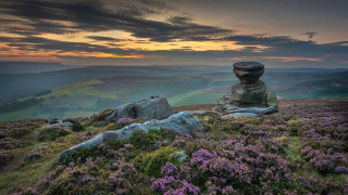 Rock formation grassy hill purple - a grassy hill free wallpaper