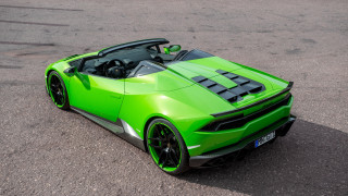 Green sports car parking lot - its hood free wallpaper