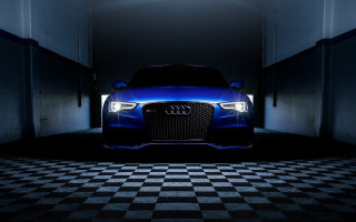 Blue car dark garage checkered - a dark garage free wallpaper