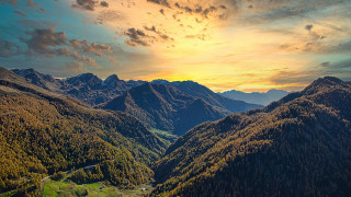 Mountain range sunset clouds cityscape - a sunset in the background free wallpaper for desktop