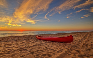 Red canoe sunset beach clouds - a beautiful sky free wallpaper
