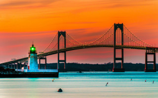 Bridge lighthouse dusk redsky cityscape - a red sky free wallpaper
