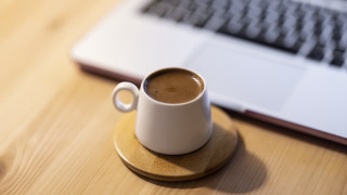 Coffee cup saucer laptop keyboard - a keyboard free wallpaper