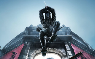 Statue man building sky red - top of a building free wallpaper