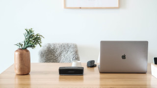 Laptop wooden desk plant phone - a wooden desk next free wallpaper