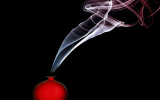 Red vase smoke black background - a red ball free wallpaper