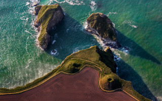 Water rocks beach sky stars - two large rock free wallpaper
