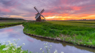 Windmill green field river sunset - a windmill free wallpaper