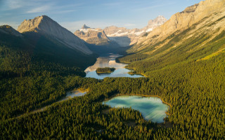 Valley lake mountains snow tiltshift - a view of a valley free wallpaper